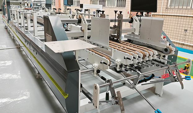 Automatic box gluing machine